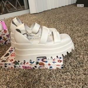 Brand new Naked Wolfe platform sandals